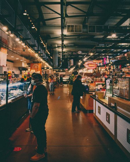 people shopping in grocery store